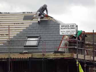 Roofers in Action.